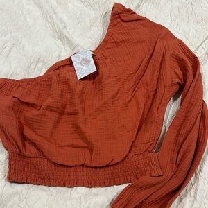 Got this from a local boutique store. Never wore it